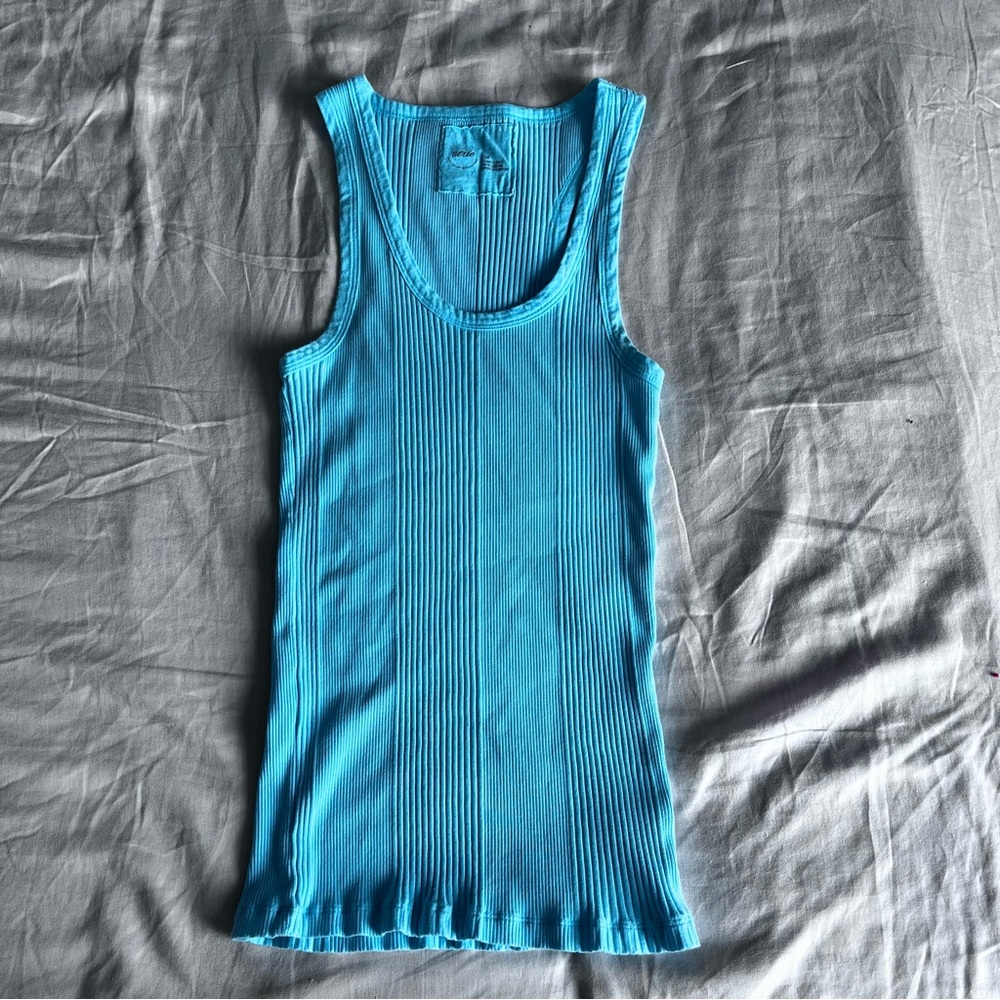 Light blue tank top - women’s medium- barely worn- good condition- nice fabric